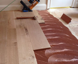 photo of Green Step Flooring photo of Green Step Flooring wide plank hardwood floor installation 